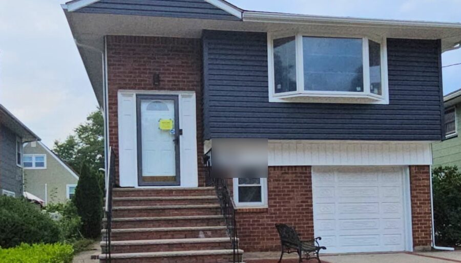 Siding replacement, high ranch - after