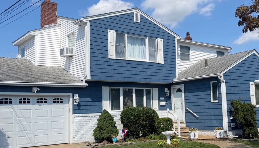 Siding replacement, split-level - after